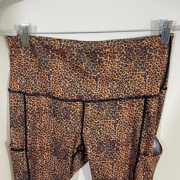 N.W.T. Yomover sz Md compression leggings in a brown animal print - Picture 2 of 10
